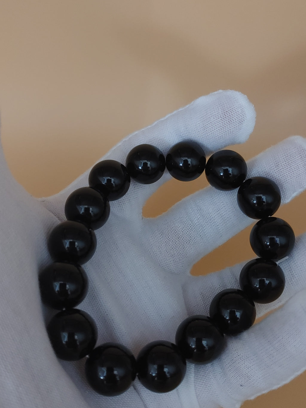 Midnight Black 12.4 mm Obsidian Bracelet (#B901) — hand-held view