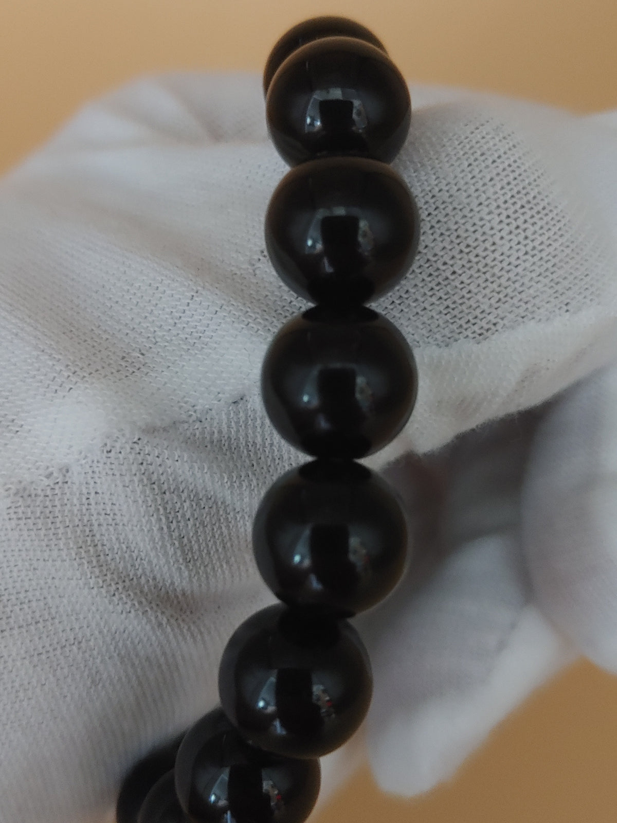 Jet Black 10.3 mm Obsidian Bracelet (#B905) - close-up bead detail 2