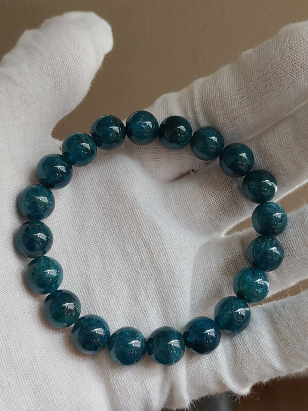 Deep Teal 9.7 mm Blue Apatite Bracelet (#B909) - hand-held view