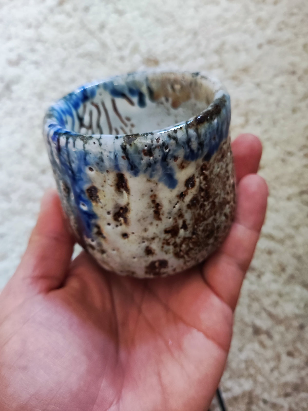 Rain on White Stone — Shino Wood-Fired Teacup — product view 2