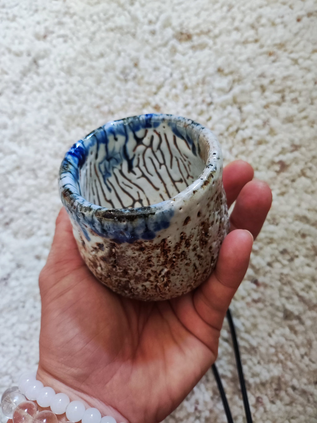 Rain on White Stone — Shino Wood-Fired Teacup — product view 4
