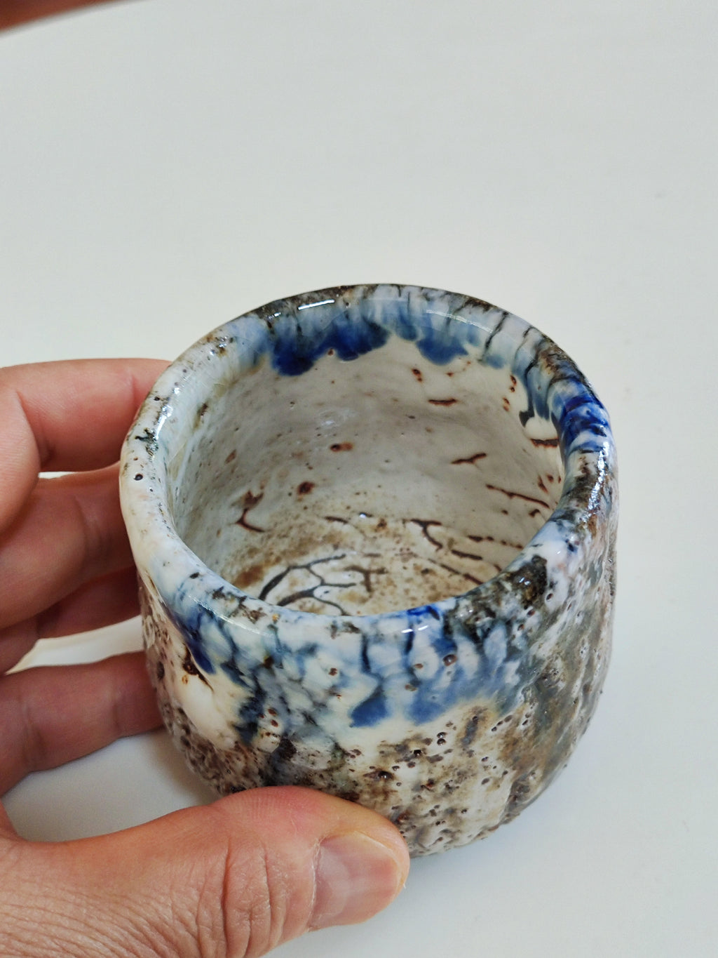 Rain on White Stone — Shino Wood-Fired Teacup — product view 3