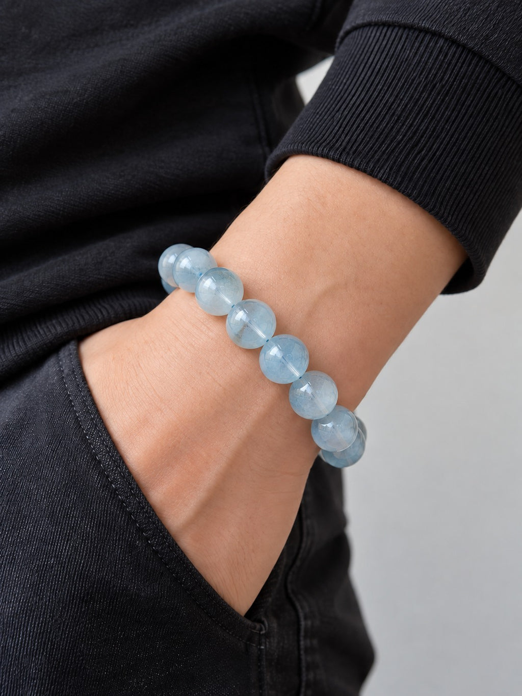 Pale Aqua 13.8 mm Aquamarine Bracelet (#B903) worn on a wrist