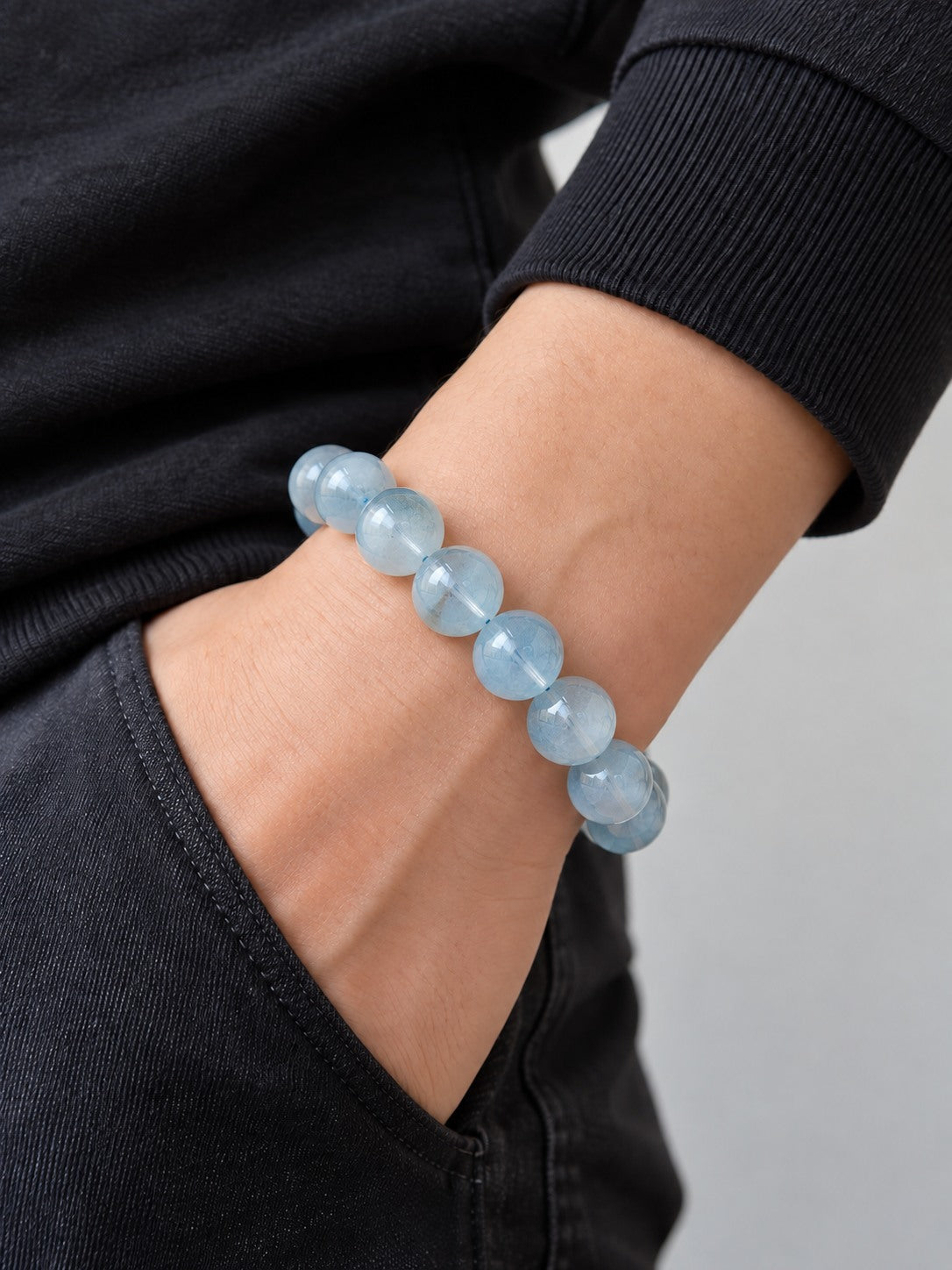 Pale Aqua 13.8 mm Aquamarine Bracelet (#B903) worn on a wrist