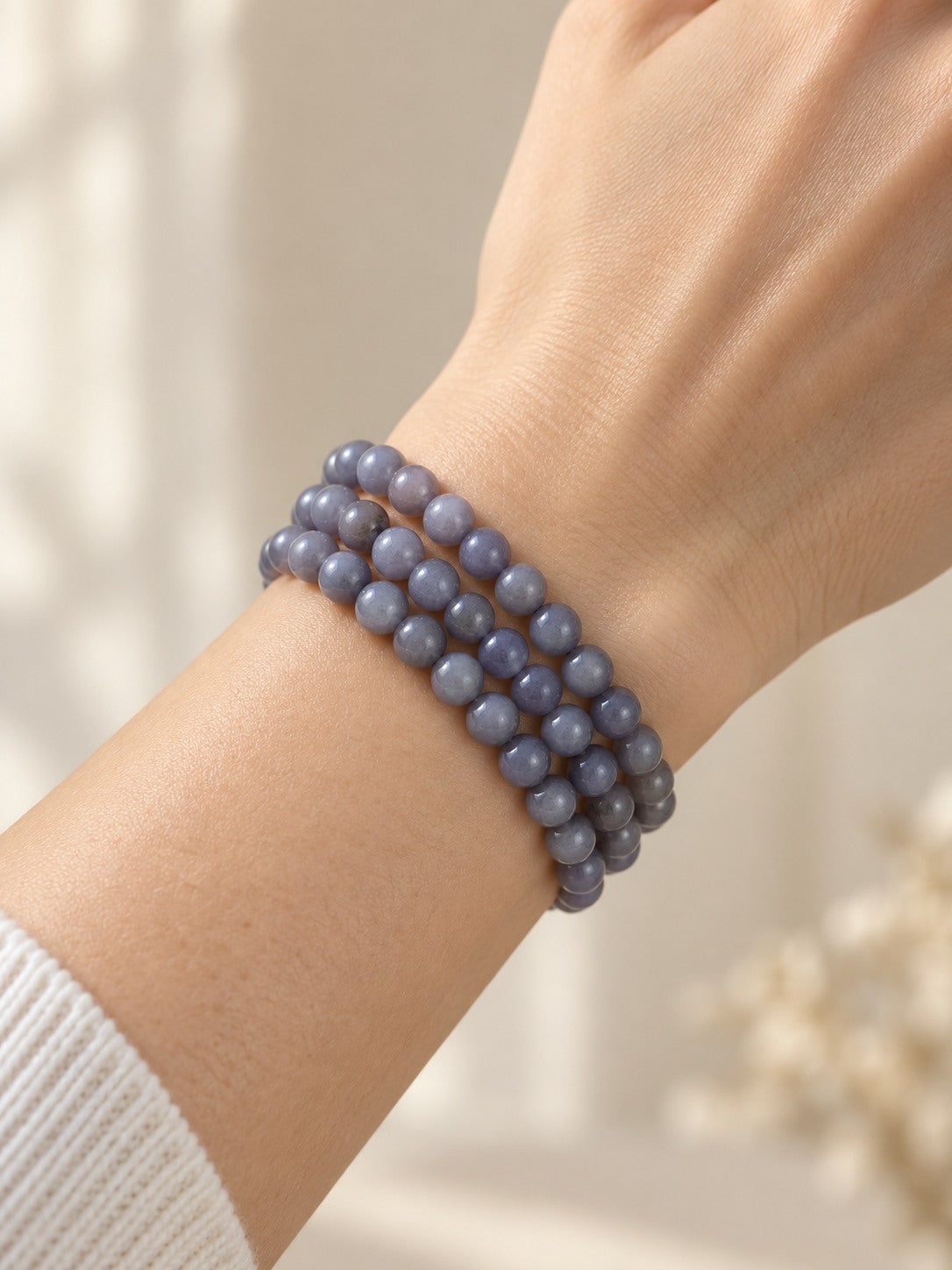 Grey-Lavender 6.3 mm Iolite Triple-Wrap Bracelet (#B910) worn on a wrist